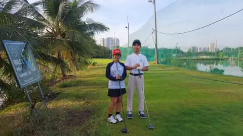 Two students at a lakeside range