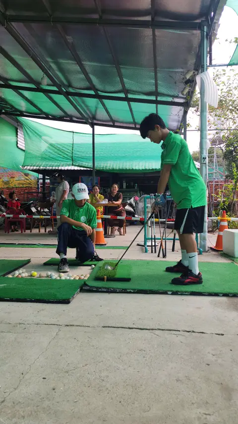 Coach guiding a child