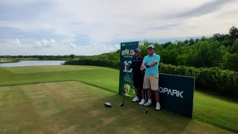 Two people on the tee at the Royal Cup